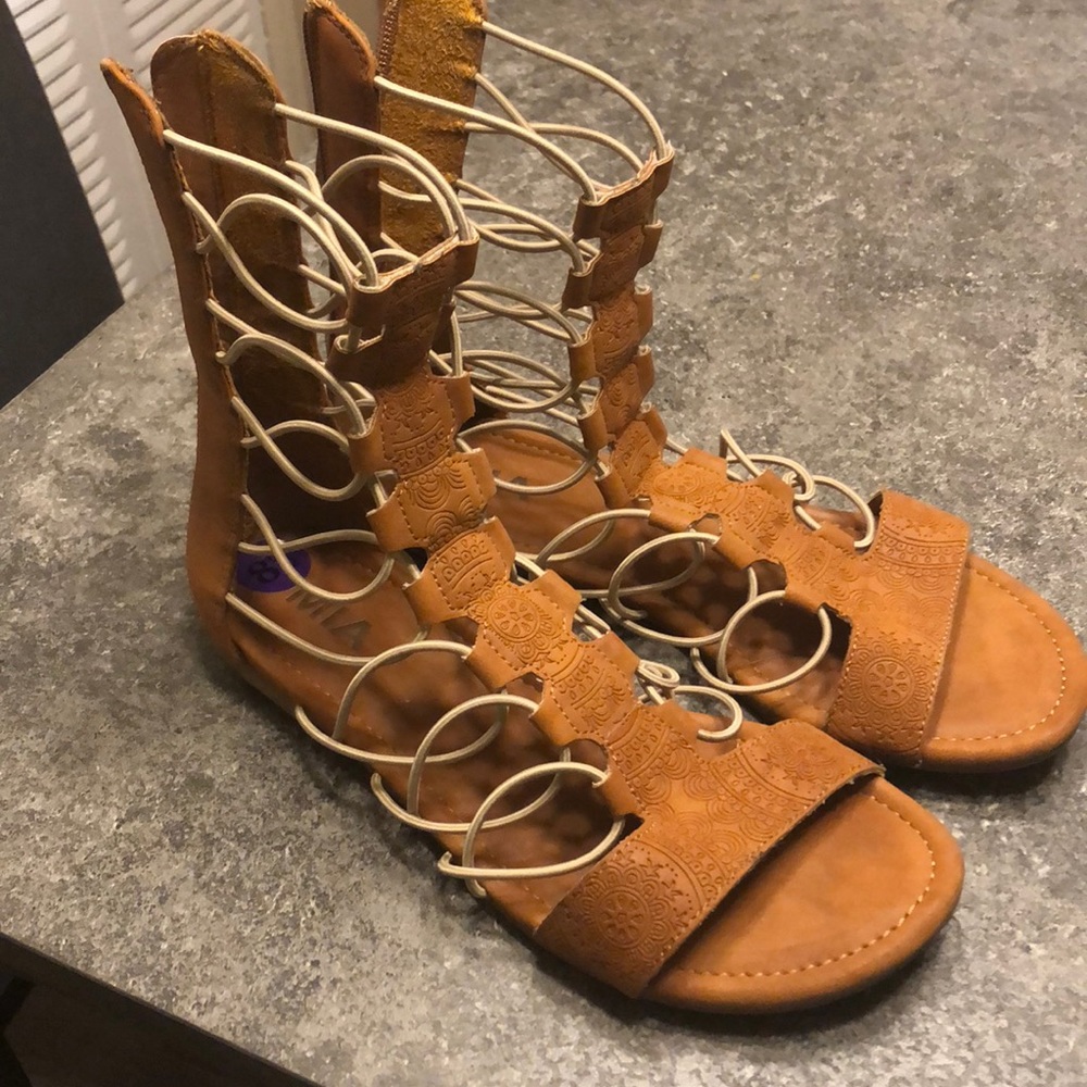 Tall gladiator sandals with detail